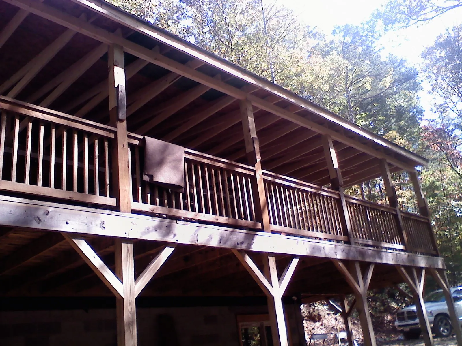 Timber framing under a new elevated porch and deck — Roof Leak Repair in Running Springs by Roofing Brothers